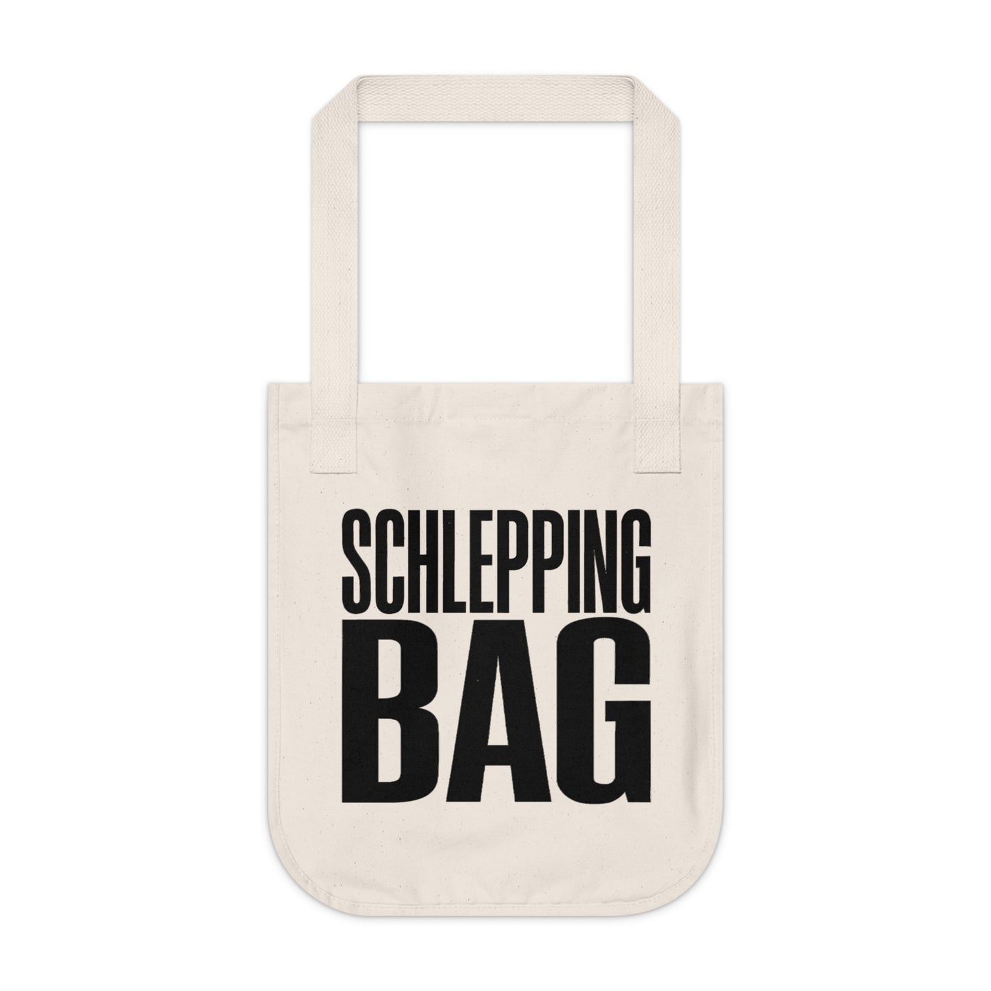Beige tote bag with black text 'SCHLEPPING BAG' on a white background