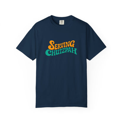 Navy blue t-shirt with 'Serving Chutzpah' text in orange and green on a white background