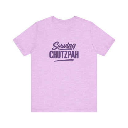 Purple t-shirt with 'Serving Chutzpah' text on a white background