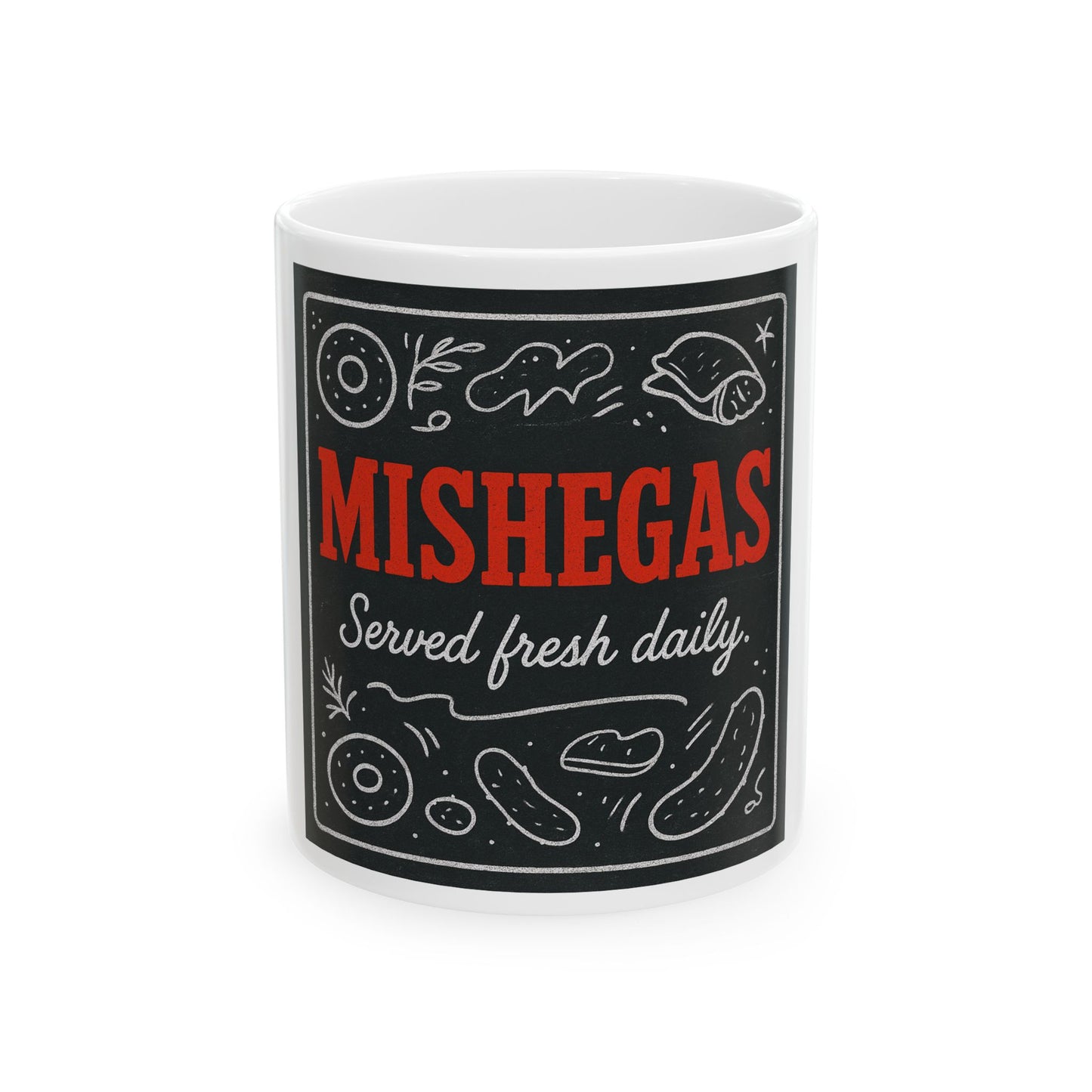White mug with black label featuring the text 'Mishegas Served fresh daily' on a white background