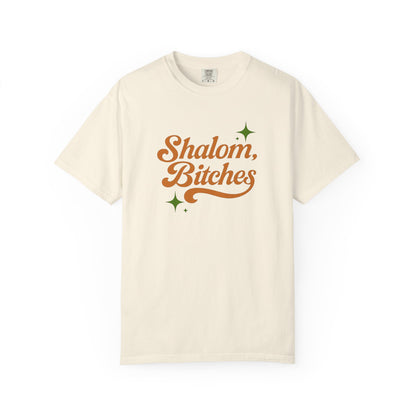 Ivory t-shirt with 'Shalom, Bitches' text on a white background