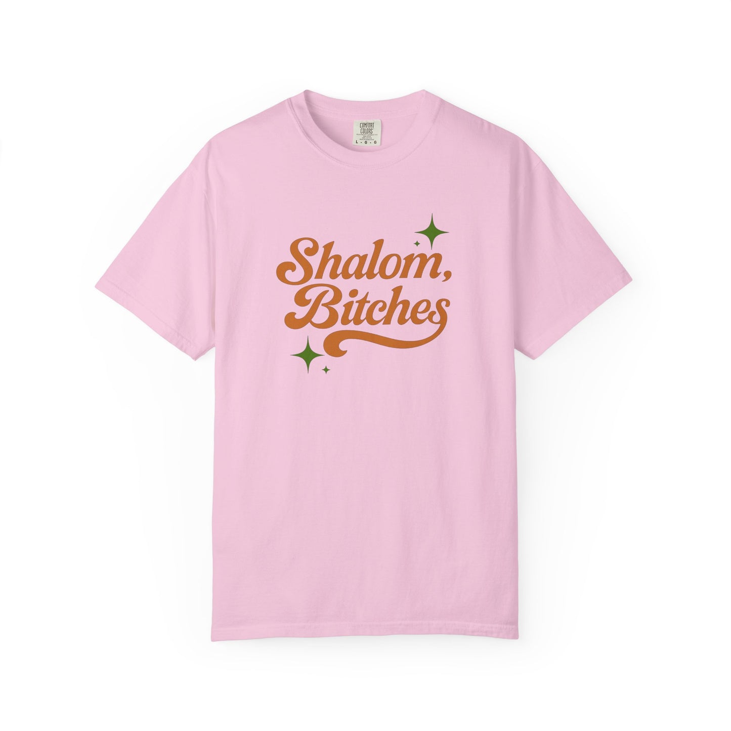 Pink t-shirt with 'Shalom, Bitches' text on a white background