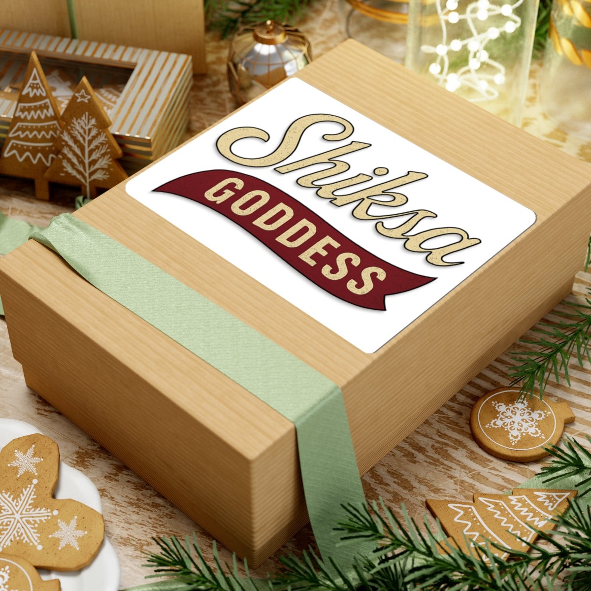 Wooden gift box with 'Shiksa Goddess' label on a festive background with cookies and decorations.