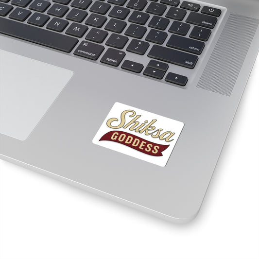 Laptop with a 'Shiksa Goddess' sticker on the palm rest area