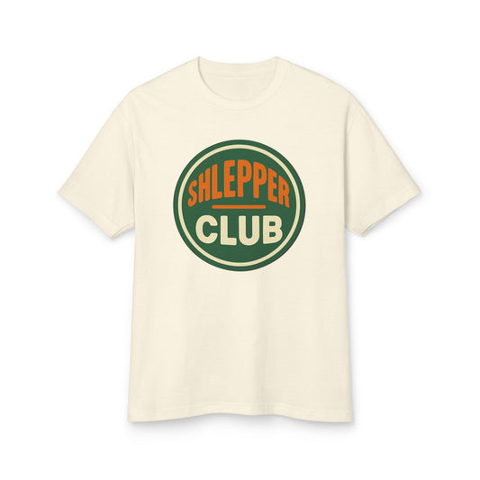 Beige t-shirt with 'Shlepper Club' logo on a white background