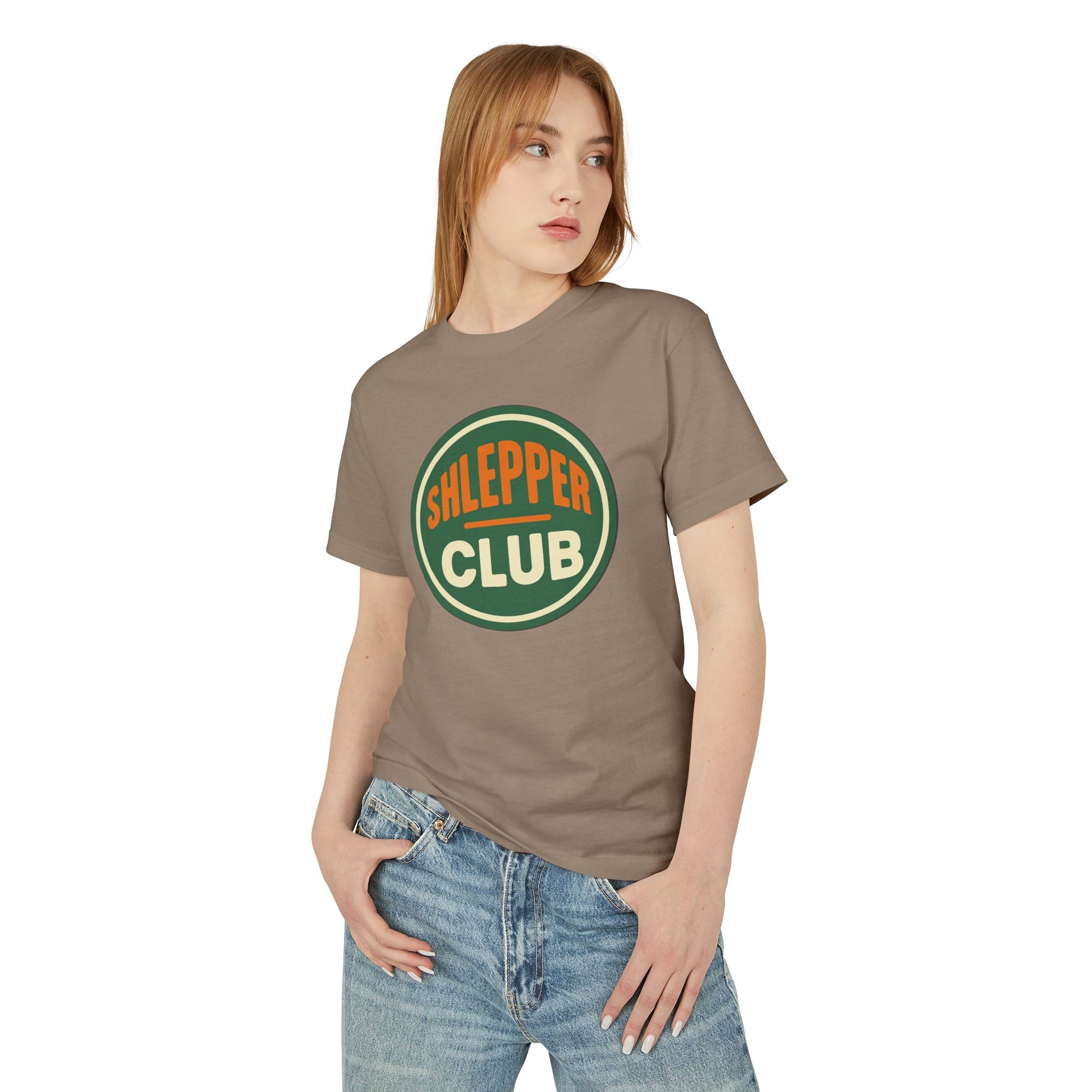 Woman wearing a brown t-shirt with 'Sleeper Club' logo on a white background