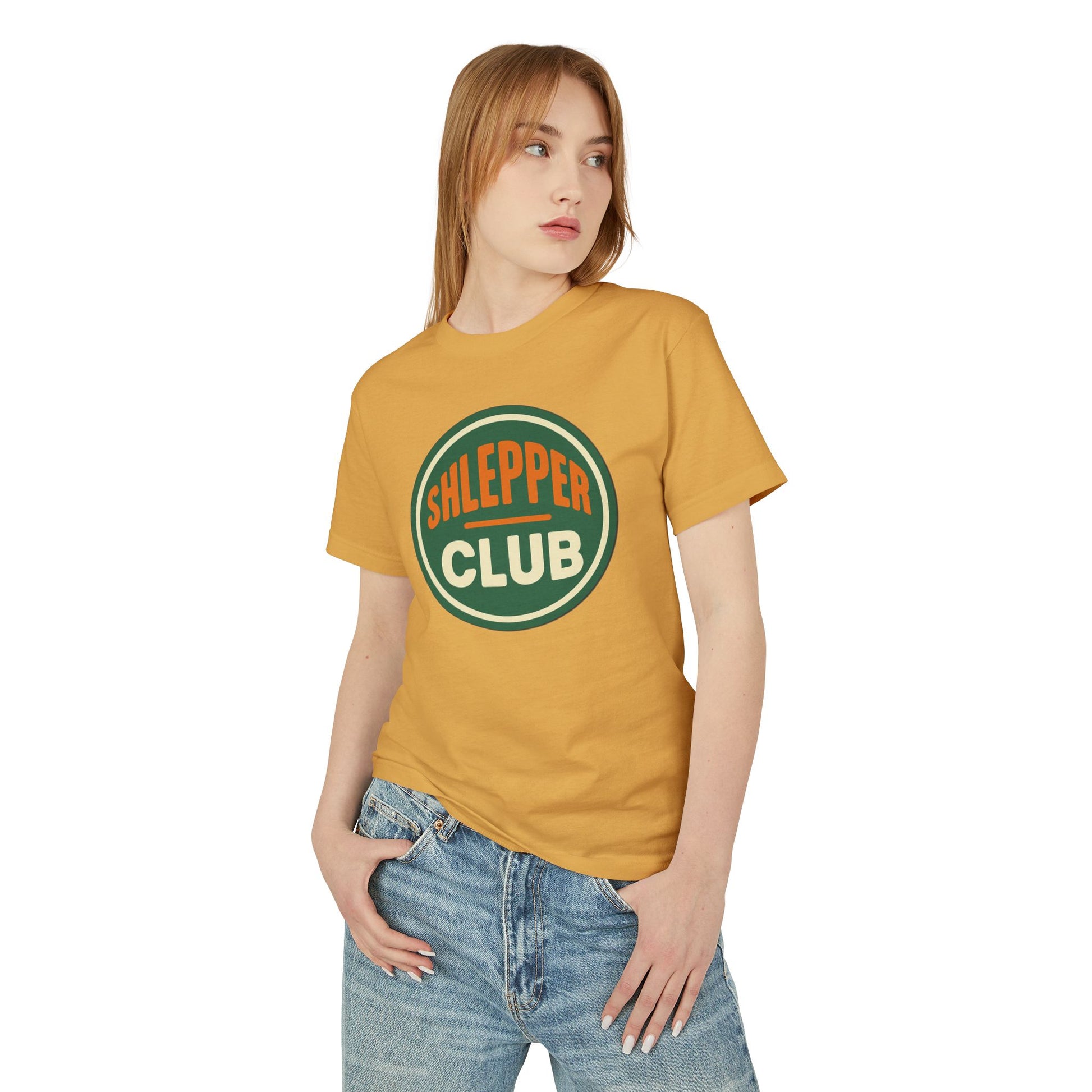 Woman wearing a mustard yellow t-shirt with 'Slepper Club' design on a white background