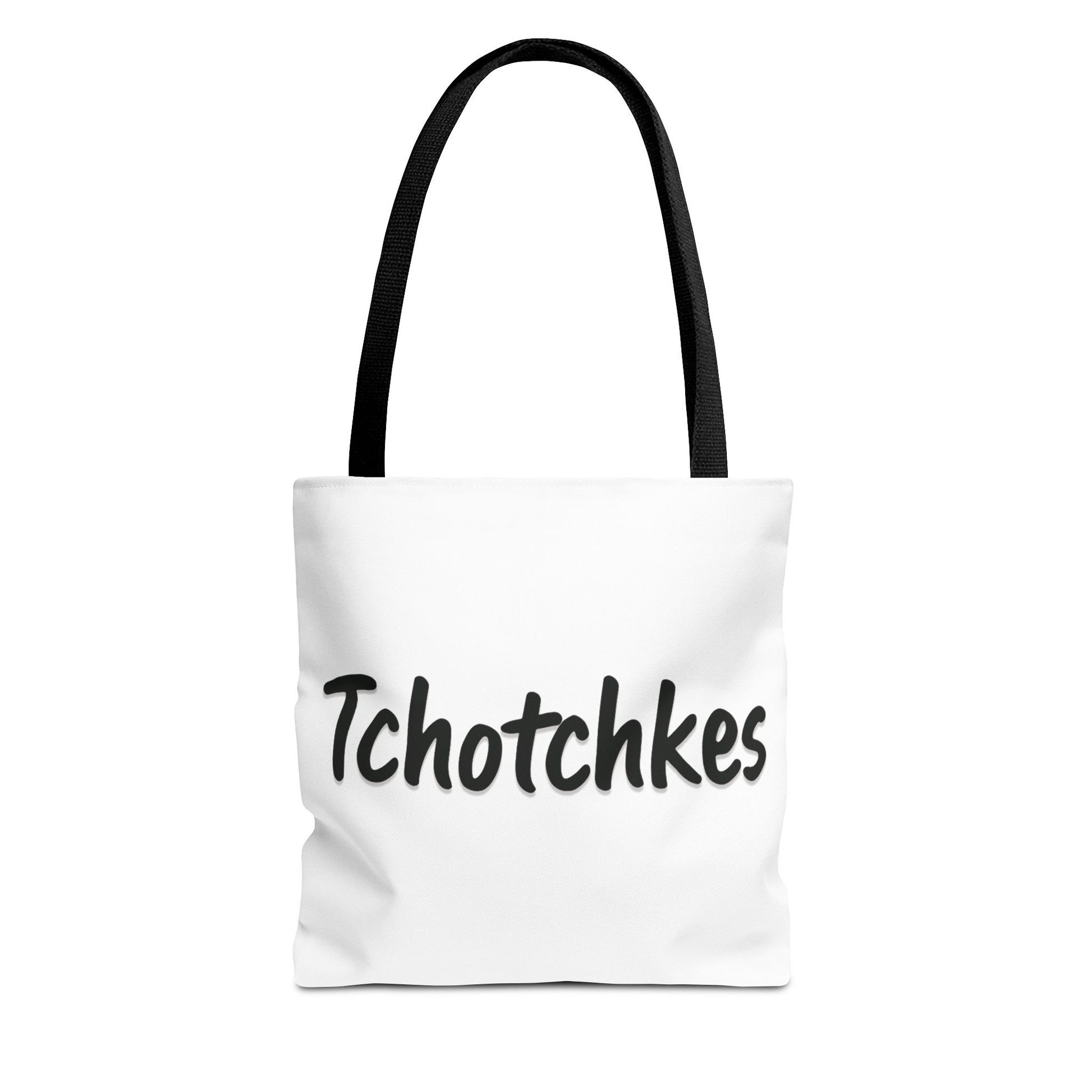 White tote bag with 'Tchotchkes' text and black handle on a white background