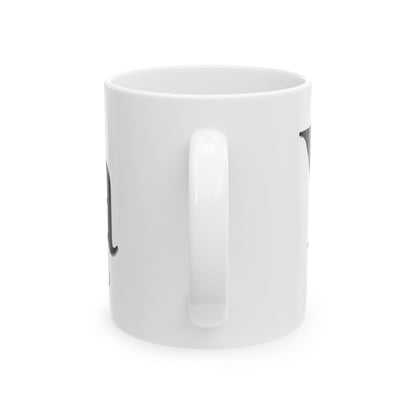 White mug with black handle on a white background