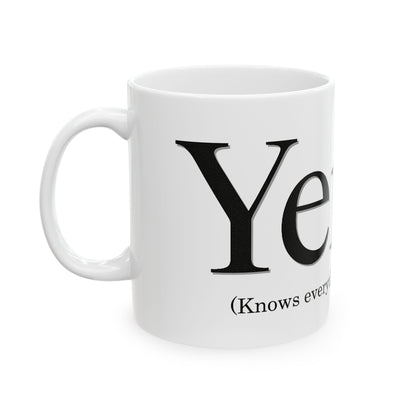 White mug with black text on a white background