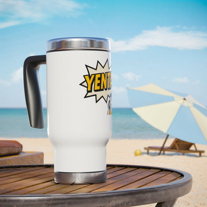White travel mug with a 'yenta' design on a beach table with ocean and umbrella in the background